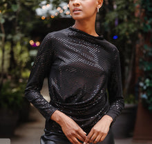Load image into Gallery viewer, This shimmery top has all the flattering aspects for a “wow” effect on your evening out. Black shimmer is perfect for those special parties or a night out on the town. And it is stretchy, making this top oh so comfy too